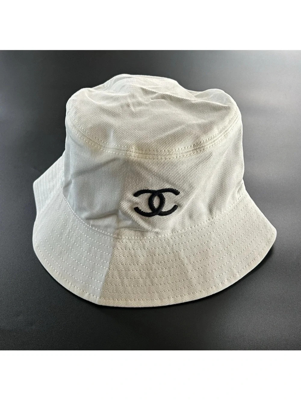 CHANEL Cream Bucket Hat with Black CC Logo